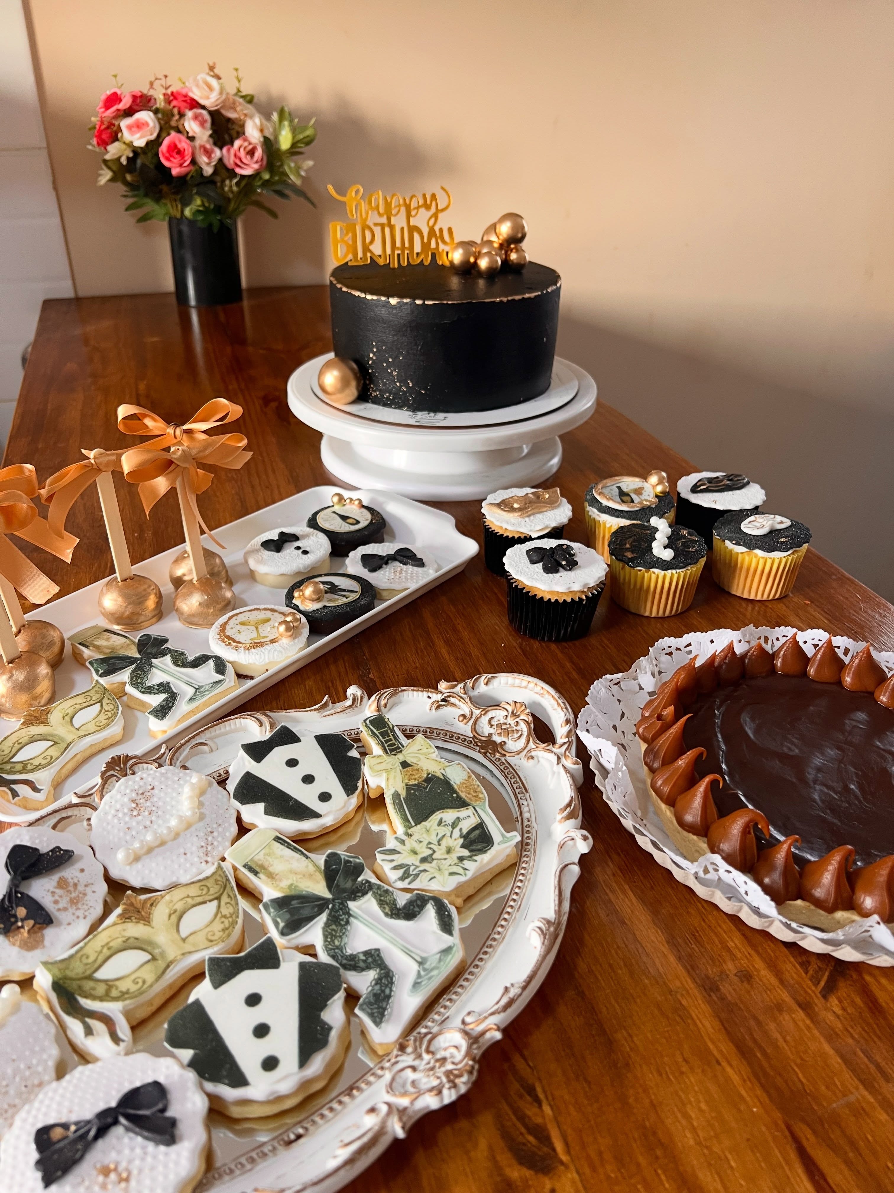 Mesa dulce y torta de cumpleaños preparadas por Sol